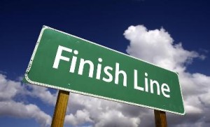 bigstockphoto_Finish_Line_Road_Sign_4335613_1_-390x236